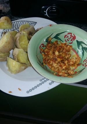 A picture of Sweet potatoes and egg sauce.