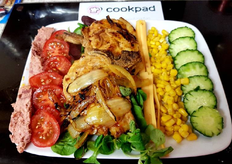 Recipe of Perfect My Peri Peri Pork Chops and Pepper flakes with onions &amp; Salad 😍