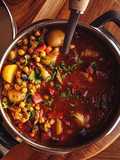 Guiso de vigilia con garbanzos picantes con harissa en Thermomix