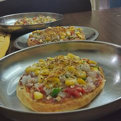 A picture of Veg pizza at home.