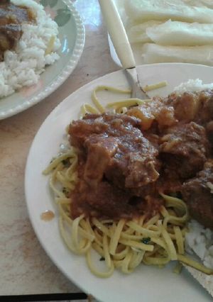 Una foto de Estofado con arroz con queso y fideo a la manteca