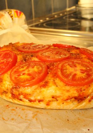 Una foto de Pizza fugaceta (creo que así se llama) y otra fugazza a la italiana