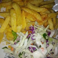 A picture of Chips and salad.