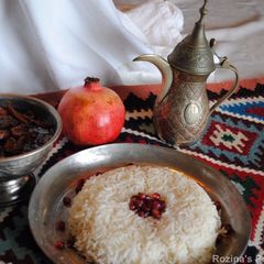 A picture of Khoresht-e Fesenjan ( Pomegranate stew with chicken and walnut.