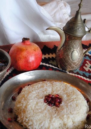 A picture of Khoresht-e Fesenjan ( Pomegranate stew with chicken and walnut.