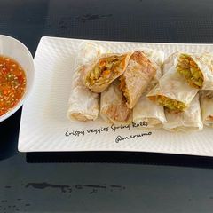 A picture of Crispy Veggies Spring Rolls.