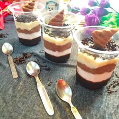 A picture of Four layered chocolate mousse.