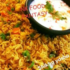 A picture of Burnt Garlic Mexican Rice with Minced Chicken.