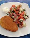 Apanado de pollo con verduras al horno