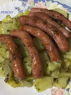 Una foto de Asado oreganado con salchichas al brandy