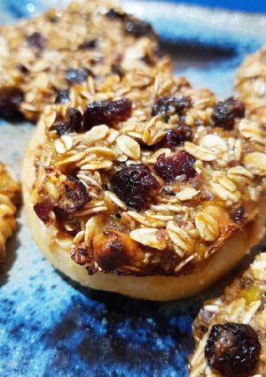 A picture of Baked oats medallions over nut apple donuts.