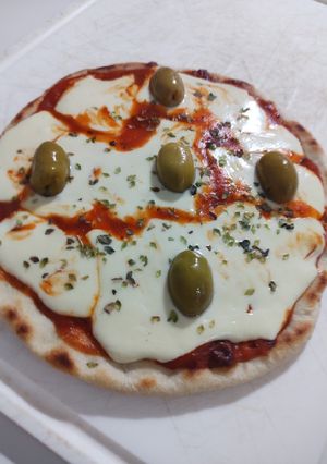 Una foto de Pizza en olla