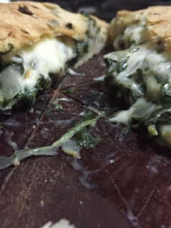 Una foto de Calzone de espinaca