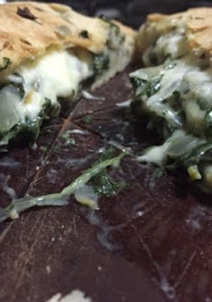 Una foto de Calzone de espinaca