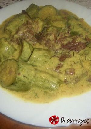 A picture of Lamb with baby courgettes, in an egg-lemon sauce.