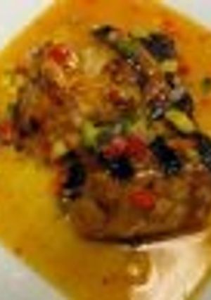 A picture of Cajun grilled salmon with mango relish.