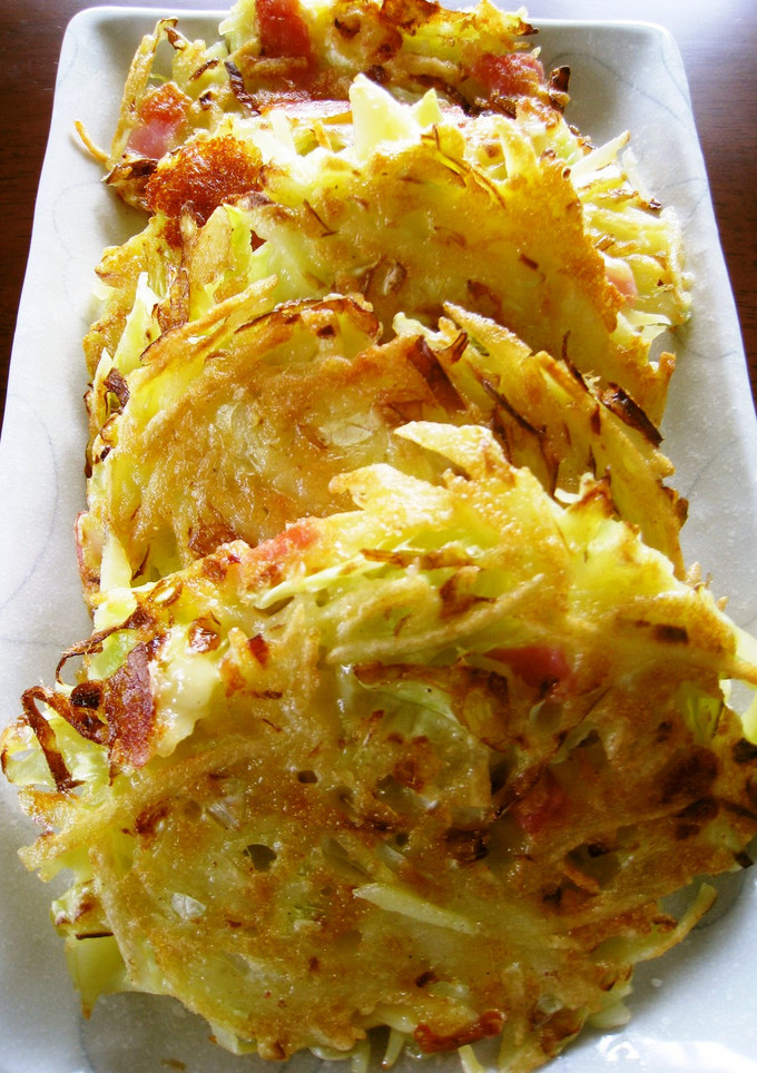 A picture of Cheesy Baked Potatoes and Cabbage.