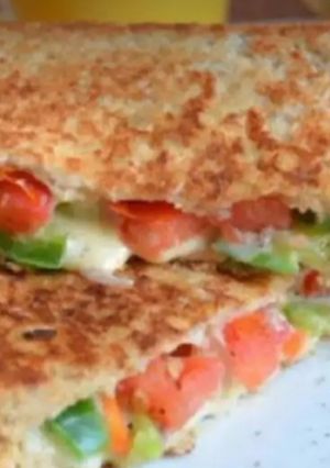 A picture of Cheese vegetable sandwich.