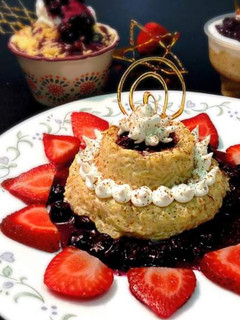 A picture of Rice Pudding with Blueberry Compote.