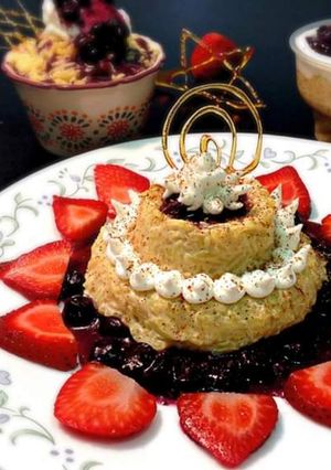 A picture of Rice Pudding with Blueberry Compote.