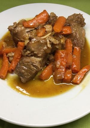 Une photo de Sauté de porc confit à l'orange