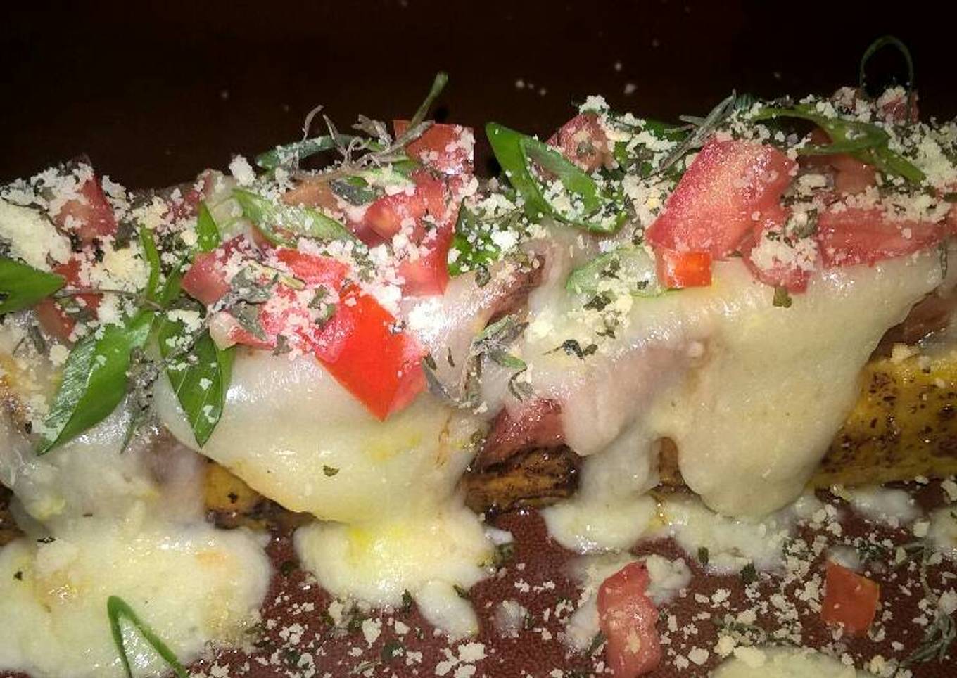 Tevaughn's non traditional Canoa de Platano stuffed with teriyaki chicken and mozzarella (ripe plantain canoe)