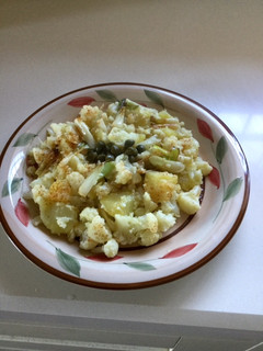 Una foto de Coliflor con ajetes