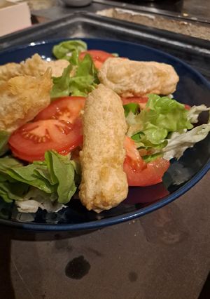 Une photo de Beignet de fromage au sésame