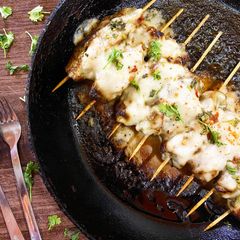 A picture of Malai boti with cheese sauce.