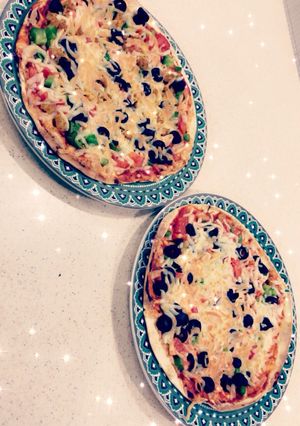 صورة لوصفة بيتزا بالخبز العربي 😍👏🏻
