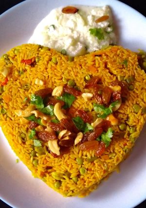A picture of Veg Pulav with Cucumber Raita (Pulav Prepared in Pressure Cooker).