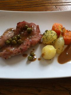 Una foto de Contramuslos de pavo en salsa de vino dulce