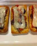 Roasted Red Pepper, Anchovy, and Manchego Cheese Toasts