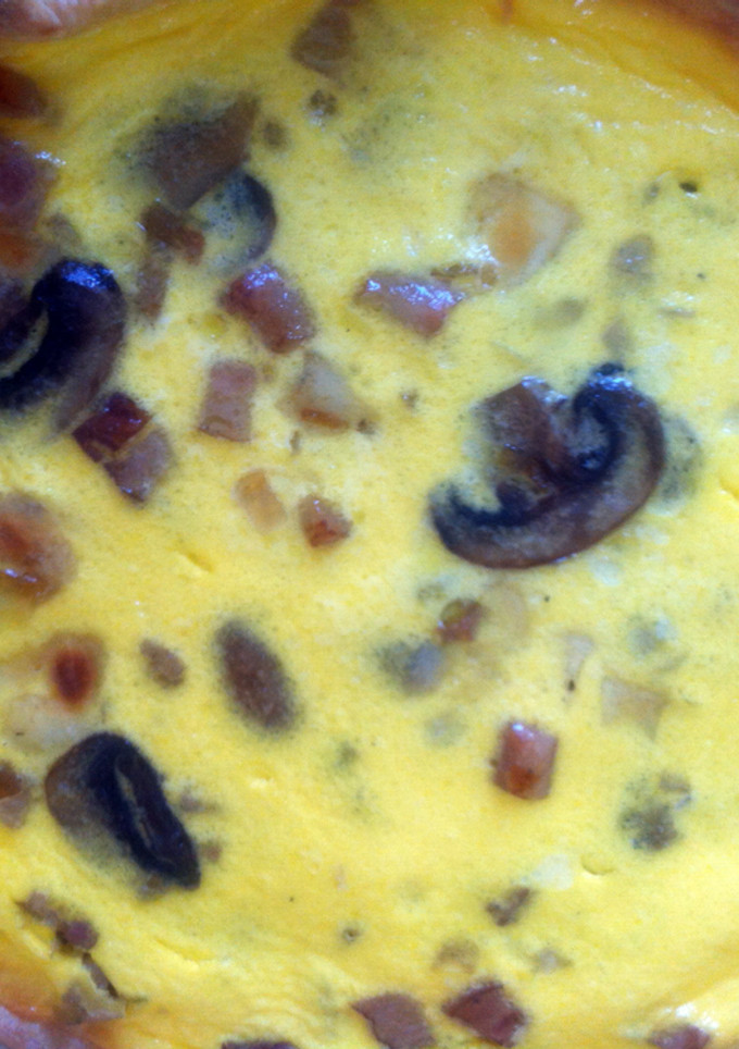 Una foto de Quiche de puerro, bacon y champiñones