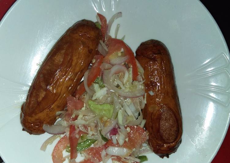 Beef sausages with salad
