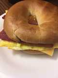 Bacon egg and cheese bagel (or vegetarian)