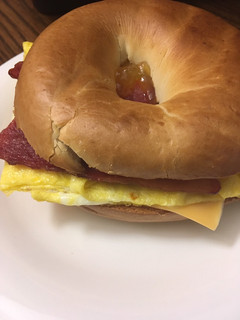 A picture of Bacon egg and cheese bagel (or vegetarian).
