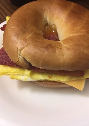 A picture of Bacon egg and cheese bagel (or vegetarian).
