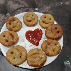 A picture of Smilyes made by potatoes.