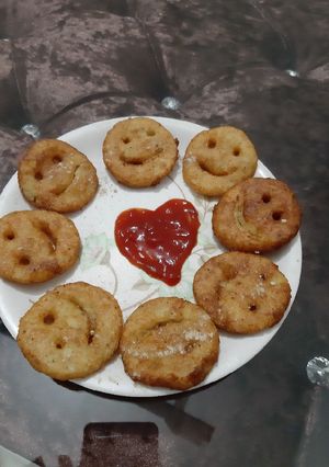 A picture of Smilyes made by potatoes.