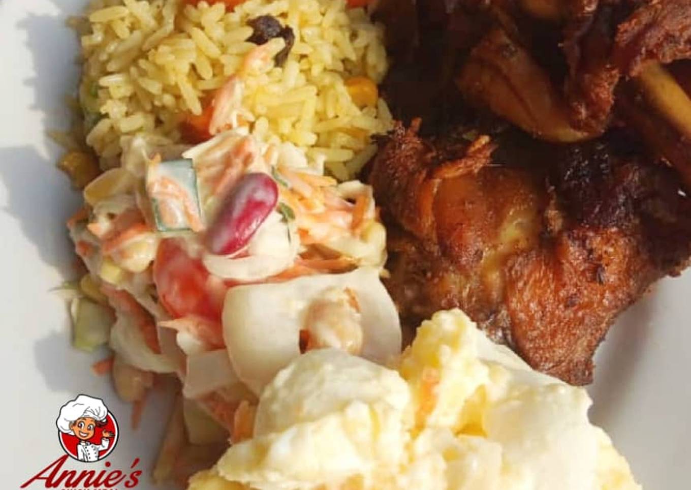 Fried rice,Jollof rice,Fried chicken, Potatoe Salad and coleslaw