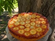Una foto de mandarinas y banana