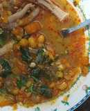 Guiso de mote mei con patitas de pollo