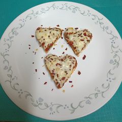 A picture of Heart ❤️ Shaped Coin Pizza.