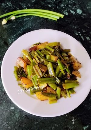 A picture of Onion Flower And Potato Fry(Pyaaz Kali Aloo Bhaja).