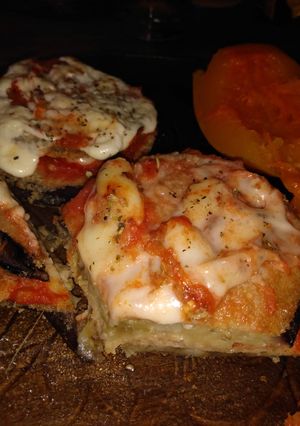 Una foto de Milanesas de Berenjenas Napolitanas con Calabaza