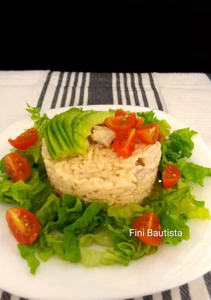 Una foto de Ensalada de arroz con piña y lomo