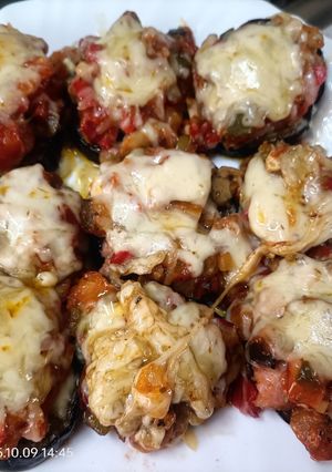 Una foto de Berenjenas con pollo verduras y champiñones gratinados