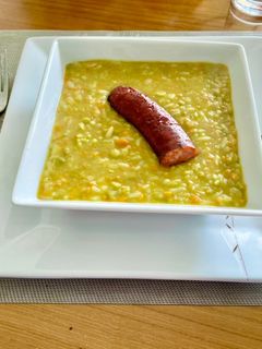 Una foto de Guisado de arvejas y zanahorias