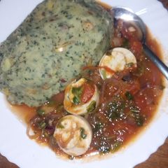 Mukimo with egg curry A picture of Mukimo with egg curry.